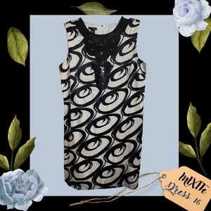Mixite -Size 16 - Silky black and white abstract dress with sequin neckline.